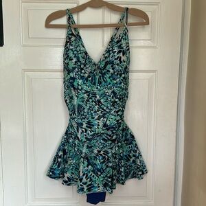 Flattering shore club swimsuit, in blues and greens.